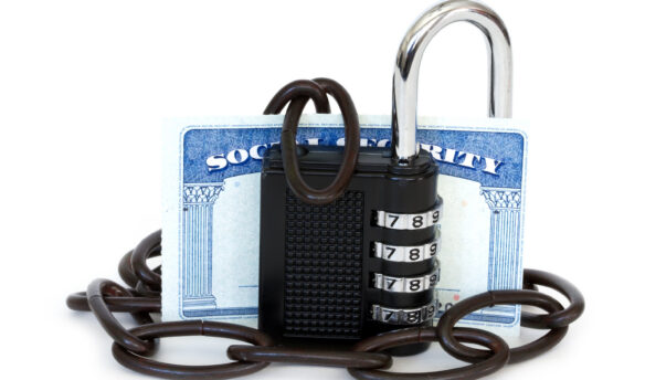 Social Security Card with Lock and Chain around it